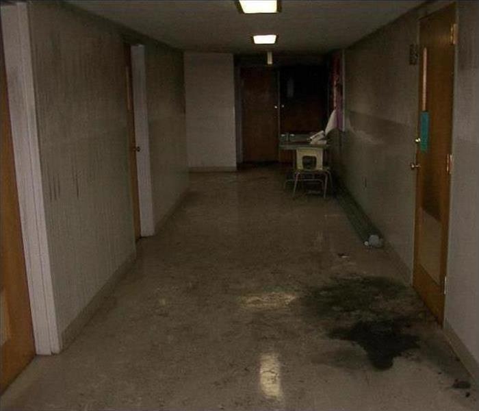 Damaged dirty commercial hallway